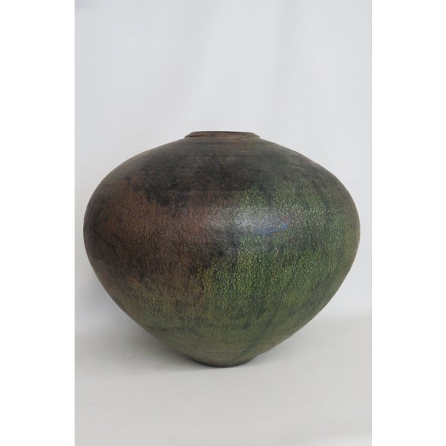 This gorgeous Large Raku Vase / Vessel is made out of ceramic. This stunning piece was made in 1983 and was signed on the...