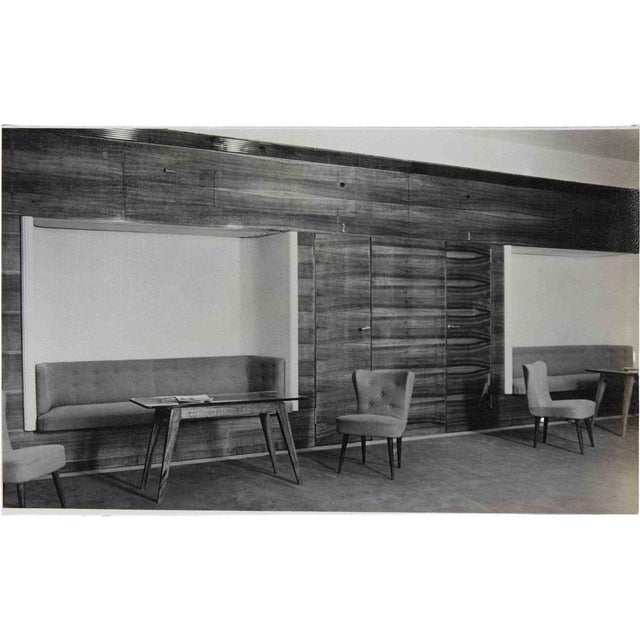 Vintage black and white photograph showing the interior of a fashion salon, most probably the NK Department Store...