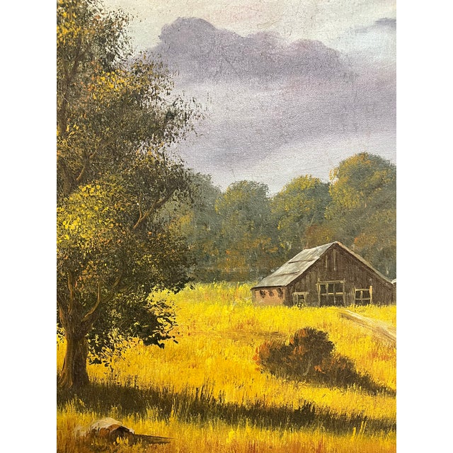 A serene landscape oil painting on canvas of a farmhouse and majestic mountains in the background by Texas artist, Dewey...