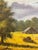 A serene landscape oil painting on canvas of a farmhouse and majestic mountains in the background by Texas artist, Dewey...