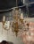 Early 20th century petite Italian giltwood and crystal 4-light chandelier. Circa 1920. The chandelier has been...