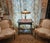 This antique Art Nouveau or Arts and Crafts style, table lamp from the early 20th century, features cream and caramel-...