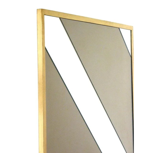 Wall mirror Italy, 1970 Brass frame Fumé mirror bands Very good condition