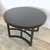 A distinguished example of American mid-century modernist furniture design, this ebonized mahogany round extension dining...