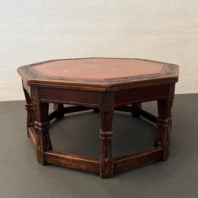 This octagonal oak coffee table was created by the Romweber Furniture Company circa 1935 known for its durable,...