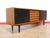 This Mid Century Modern Vintage Teak Credenza Sideboard by Nils Jonsson for P.S Hegg is a very rare piece of furniture...
