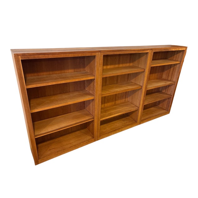 Beautifully crafted modular bookcase with clean design and timeless mid-century modern influence. Three sections with...