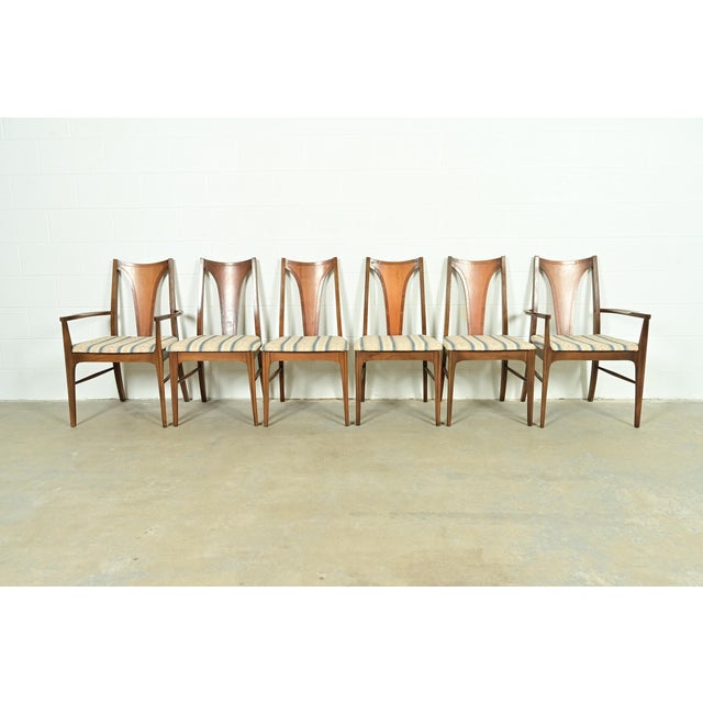 A gorgeous set of six Mid-Century Modern dining chairs By Broyhill Brasilia USA, 1960s Sculpted walnut frames, with...