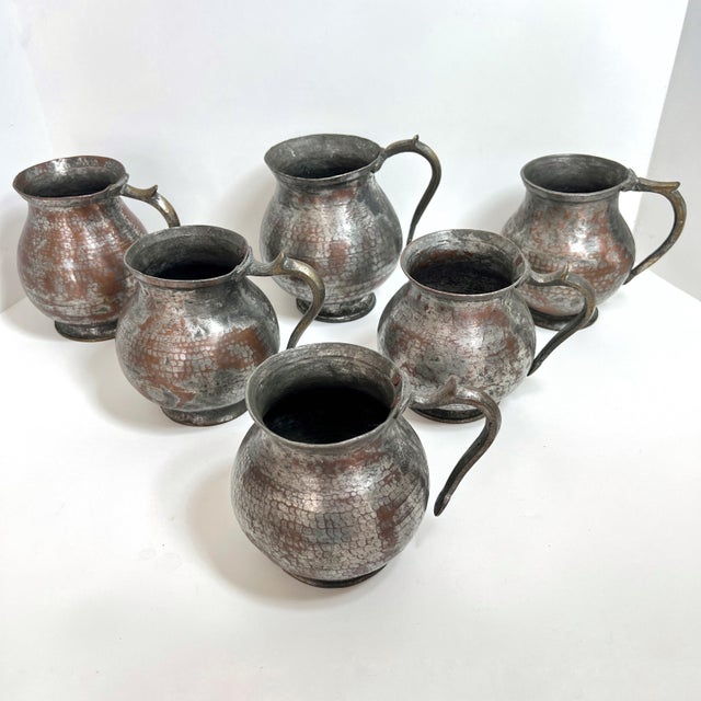 Transform your dining table with the timeless elegance of our Hand Hammered Tinned Copper Water Jugs. Exquisitely crafted,...