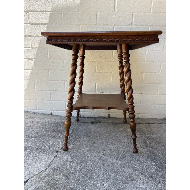 Antique Victorian or Jacobean Revival barley twist side table with lower shelf. Excellent condition. No damages or scuffs....