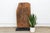 From the Awka region of southeastern Nigeria, this domestic compound door is carved in the deep, high-relief style that...