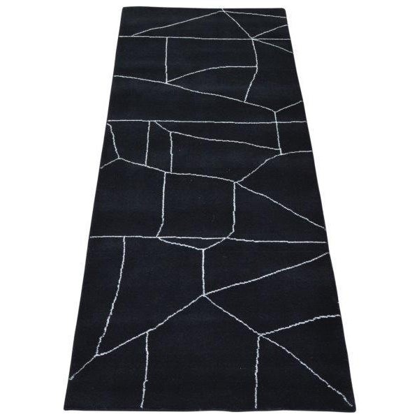 Moroccan hand knotted wool rug with abstract design.