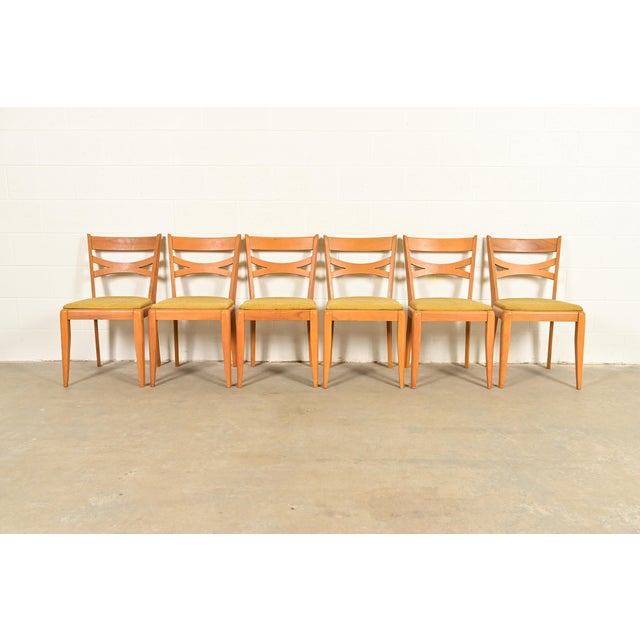 A gorgeous set of six Mid-Century Modern side chairs or dining chairs By Heywood Wakefield USA, 1950s Solid sculpted maple...