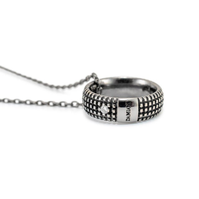 Brand: Damiani Metal Type: 18K White Gold Length: 19.00 inches Width: 0.90 mm Weight: 6.80 grams Black rhodium-plated 18K...