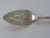 This is a rare antique pie or cake server with an intricate design and an unusual size: 11" long, approximately 2.5" at...