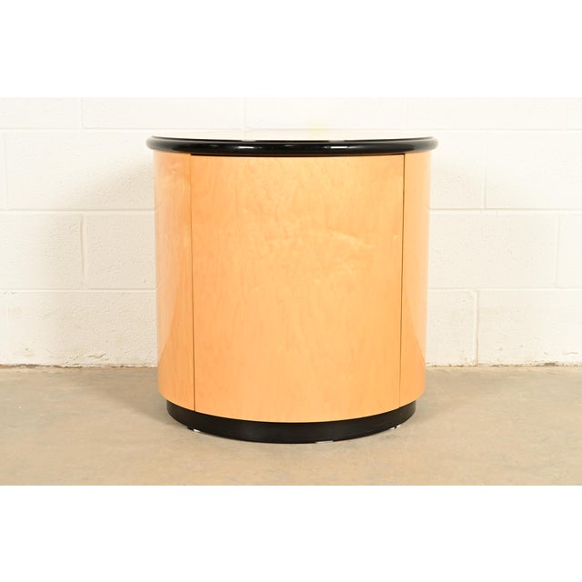 A stunning Milo Baughman style Mid-Century Modern drum side table By Henredon USA, Circa 1980s Gorgeous birdseye maple,...