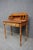A charming New England writing desk crafted by the Hitchcock Furniture Company of Connecticut. Finished in Cherry, the...