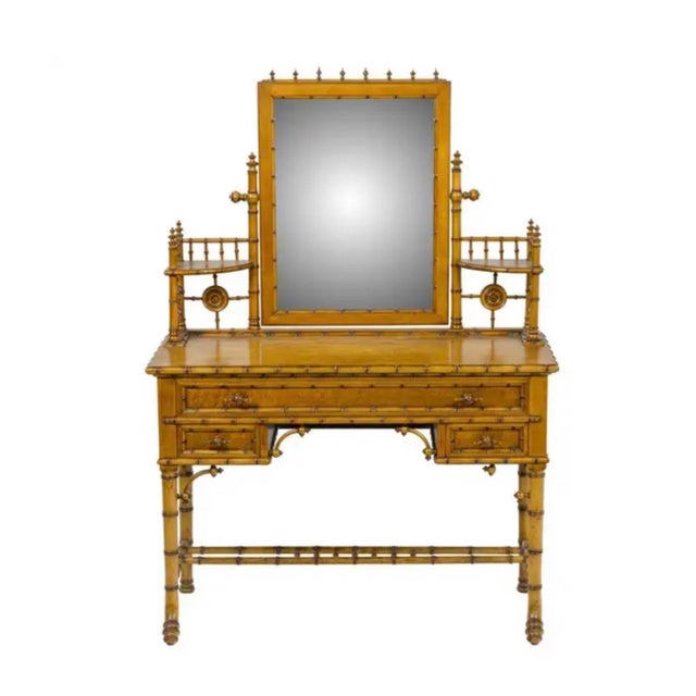 American Victorian Faux Bamboo and Bird's Eye Maple vanity, circa 1890, by R. J. Horner & Co, New York. R. J. Horner was...