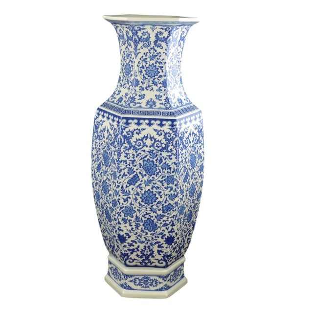 Make a dramatic statement with this stunning vintage Festcool porcelain vase, featuring a classic blue and white...