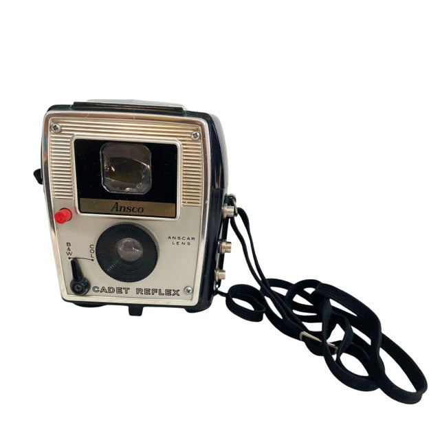 In used, untested condition, this Vintage Ansco Cadet Reflex Camera comes with its original box, the box shows wear, as...