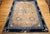 This 19th century oversized Chinese Peking rug is a timeless masterpiece, showcasing the refined artistry of traditional...