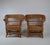 Elegant pair of early 20th-century wicker armchairs, dating from circa 1900–1920. The chairs feature an unusually...
