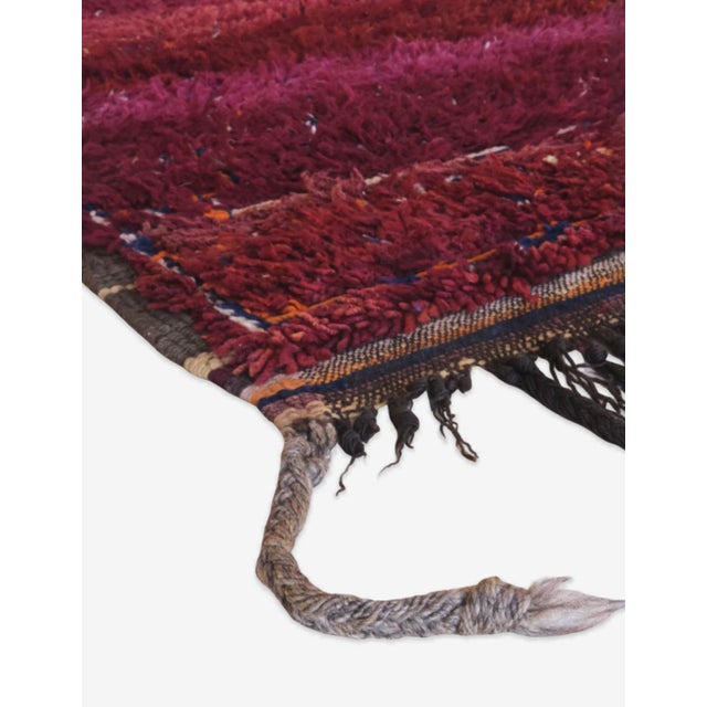 Handmade Moroccan Rug – Deep Red Wool with Timeless Warmth This handmade Moroccan rug radiates depth and passion through a...