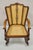 Antique Victorian Walnut and Cane Carved Rocker Rocking Chair w/ Queen Anne Legs. Circa Early 20th Century. Measurements:...