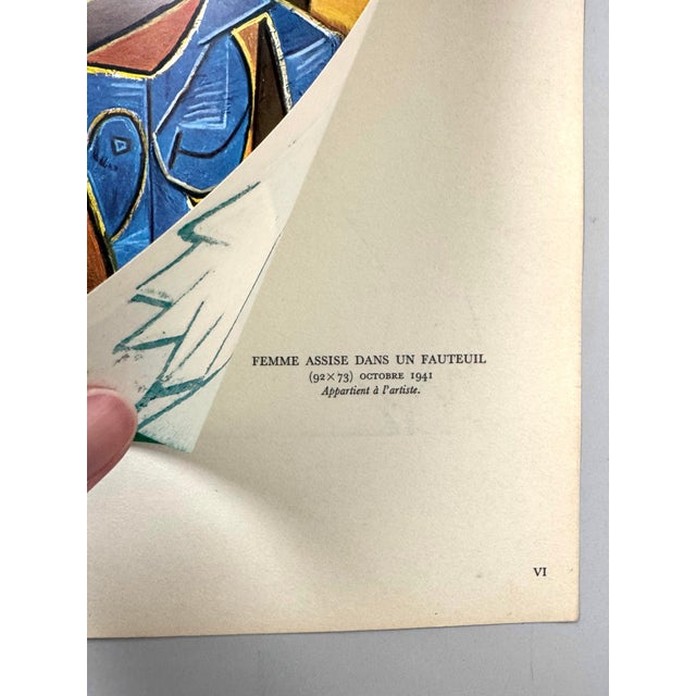 Here is an original limited edition Pablo Picasso print "Femme Assise Dans Un Fauteuil.” Published in Paris in 1950 by Les...