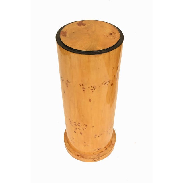 Stylish pair of Art Deco style cylindrical pedestals veneered in beautifully figured bird’s eye maple, the warm honey-...