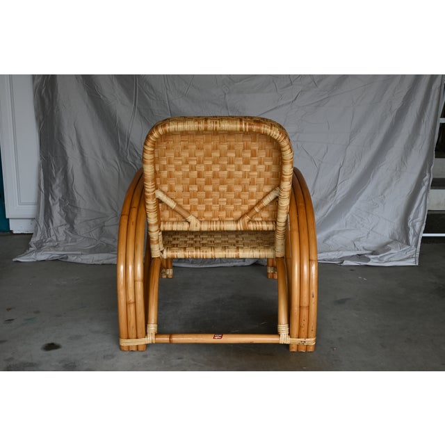 Wonderful 1950's Rattan Chair gifted to my mother from a Merchant Marine Capitan friend. This is one item from a 5 piece...