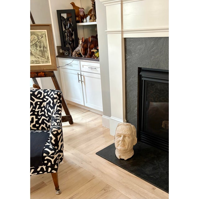 This impressive and very heavy 14-inch tall plaster bust, signed Gordon Brewster, 1969, is a striking example of mid-20th-...