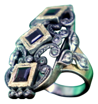 Gold and Silver Ring with Inlaid Diamond Chips and Calibrated Garnets