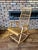 An original mid-century modern rocking chair made of solid wood, featuring a seat and backrest crafted from hand-woven...