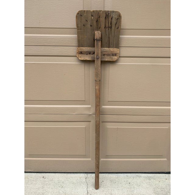 A beautiful antique rustic, farmhouse, or country wooden hand made grain shovel. This would be ideal for an installation...