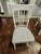 Thomasville furniture collection featuring a round glass top and a painted white wooden base with matching chairs. Heavy...