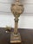 Vintage alter stick made into a lamp with added gold leaf detail.