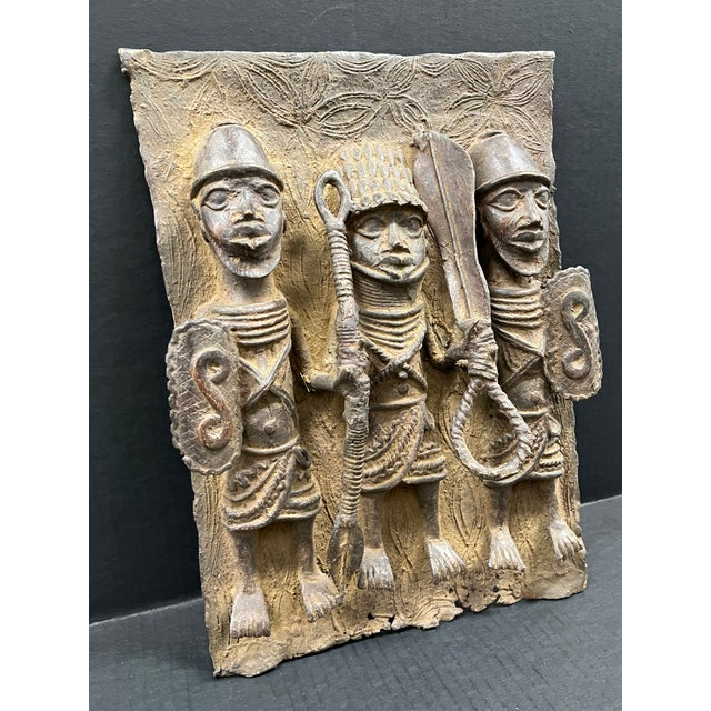 Vintage African Tribal Art Benin Bronze Wall Plaque Sculpture AGES: Late 20th Century MATERIALS: Bronze COUNTRY: Benin...