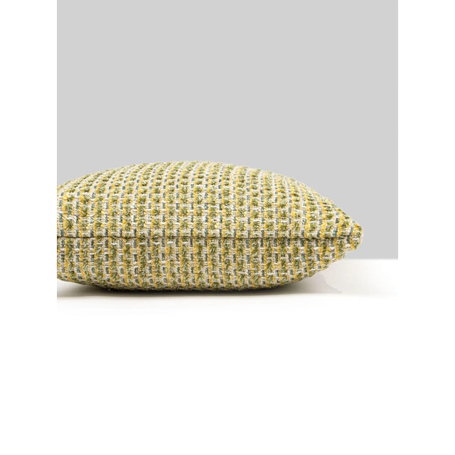 Performance fabric never looked chicer with our Heatherton woven. Featuring 14 fashionable colorways in recycled acrylic...