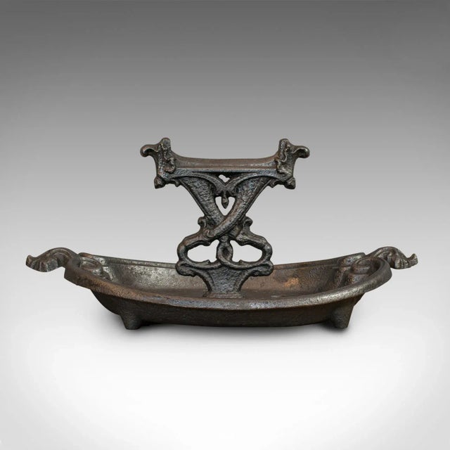 This is an antique boot scraper. An English, cast iron pull by Coalbrookdale in Art Nouveau taste, dating to the late...