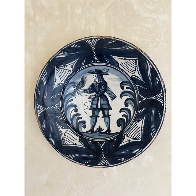 Large white and blue tin glazed dish in a style called La Corbata, made around 1900 in the Catalan region of Spain, North...