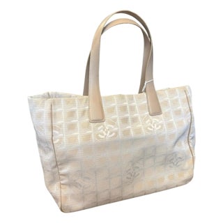 A 2003 Chanel New Travel Line Beige Nylon and Brown Leather Tote Bag For Sale