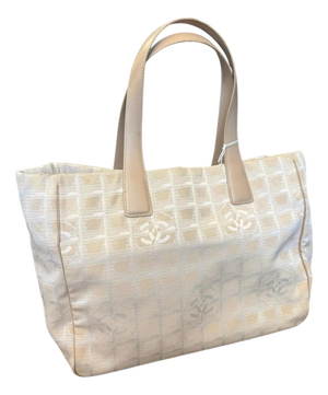 A 2003 Chanel New Travel Line Beige Nylon and Brown Leather Tote Bag