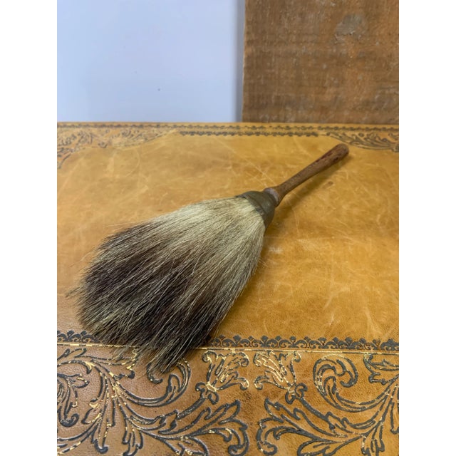 This unique and beautiful fan brush has a turned wooden handle, metal ferrule and long bristles which have wonderful...