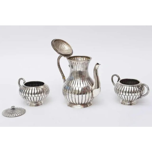 The wonderful and exquisite design of this vintage Sanborn Hallmarked Mexican polished sterling silver tea and coffee...
