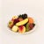 Large ceramic tabletop fruit bowl from Hispania, Spain, 1950s. One-piece body made up of a white braided ceramic base...