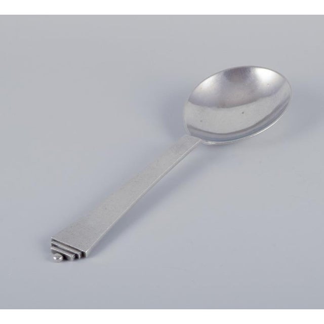 Georg Jensen Pyramid. Serving spoon in sterling silver. Hallmark: After 1944. In perfect condition. Dimensions: Length...