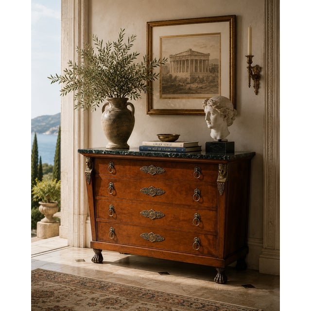 This stunning Empire-style Egyptian Revival chest of drawers by Henredon is a true statement piece, showcasing exceptional...