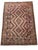 This large handwoven Afghan Maimana Ghalmori kilim has a warm brown base with cream, muted blue, dusty rose, taupe, and...