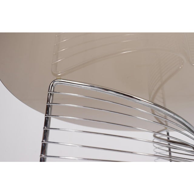 Wire Space Age Coffee Table, Germany, 1970s, metal construction with a loose smoked glass top, Dimensions approx.: H. 42...